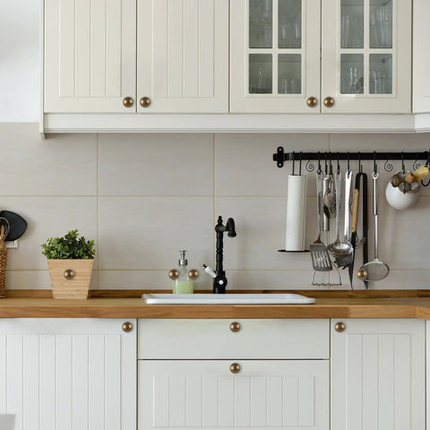 Top Shelf Antique Brass Kitchen Cabinet Knobs And Drawer Pulls Two Pack Sturdy Metal Handles on white cabinets with brass accents.