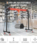 Heavy Duty 2200 Lbs Gantry Crane With 8 To 12 Ft Adjustable Height Solid Workshop Hoist And Full Manual Trolley Kit For Garage Or Shop Handling Massive Loads Without Breaking A Sweat lifting steel pipes in warehouse.