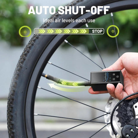 Ultra Compact Mini Bike Pump With Gauge 120 PSI Electric Bike Pump For Presta And Schrader Valves inflating a bicycle tire
