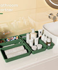 Military Grade Drawer Organizer Set With 177 Item Capacity, 28 Piece 5 Sizes In Green arranged on bathroom counter