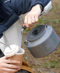Two Point Two Liter Camping Kettle For Open Flame And Stove Fast Boil Water On The Go Lightweight Tea Pot With Anti Scald Handle And Carry Bag