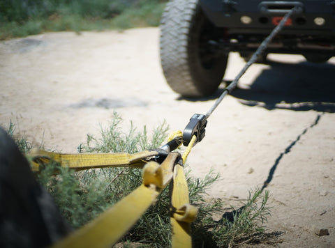 Ruggedized Off Road Soft Shackle 3/8 Inch By 10 Inch With Cordura Sleeve 43,500 Pound Break Strength Made in USA in use on a Jeep trail
