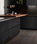 Modern kitchen with Black Wood Grain Removable Peel And Stick Wallpaper Roll For DIY Home Makeovers on cabinets and countertop.