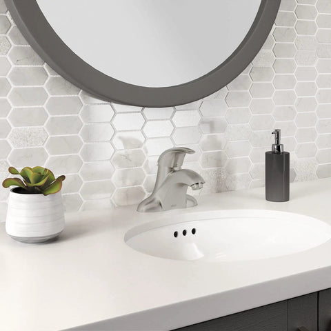 Reliant 1-Handle 4-Inch Centerset Bathroom Faucet In Brushed Nickel With Ceramic Disc Valve 1.2 GPM installed on modern sink