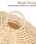 Close-up of beige woven rattan with hook on Rattan Woven Hot Air Balloon Wall Decor For Kids Room Cute Nursery Hanging Ornament