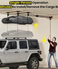Garage Ceiling Storage Hoist for Roof Cargo Box and Carrier in use above SUV showing 4-point pulley system