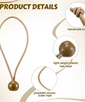 Close-up of beige 50 Pcs Ball Bungee Cords 6 Inch Tarp Tie Downs With Balls showing handmade knot and plastic ball head.