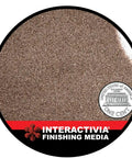 Close-up of 120 Grit Aluminum Oxide Sand Blasting Media For Cabinets And Blasting Guns next to a penny for size comparison.