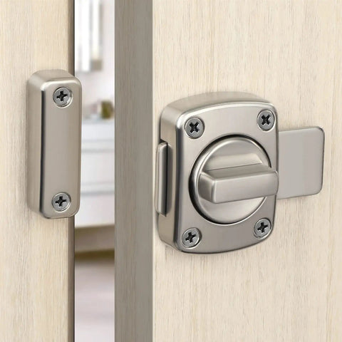 Tough As Nails Zinc Alloy Reversible Door Latch With Push Pull Bolt Lock installed on a wooden door for privacy and security.