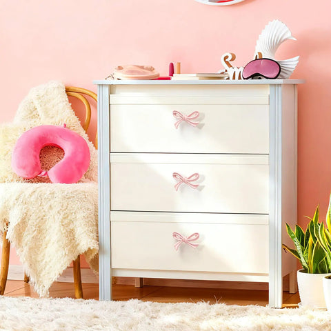 Eight Pack Pink Bow Dresser Knobs For Cabinets And Drawers Cute Vibe For Girls Bedroom And Nursery Decor Includes Two Size Options And Screws And Washers shown on white dresser in bedroom setting.