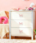 Pink Bow Dresser Knobs 16 Pack Small Decorative Cabinet Drawer Pulls for Girls Bedroom on white dresser with pink decor