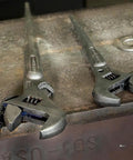 Two Extra Wide Adjustable Wrench for Heavy Nuts and Bolts by Klein Tools, 10 Inch Spud Wrench With Tether Hole on a metal surface