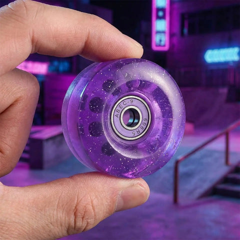 82A Purple Glitter Quad Roller Skate Wheels Four Pack For Indoor Outdoor Use, close-up of one wheel held in hand showing details.
