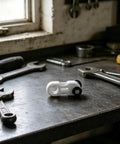 Dead Quiet Curtain Pulley Rollers With Hidden Rail Track And Dual Wheel Design For Heavy Drapes and Zero Hassle Ceiling Mount Hardware on workshop table.