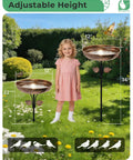 Sturdy Metal Bird Bath Garden Stake With 12 Inch Bowl Outdoors 0.7 Gallon Capacity Yard Decor For Birds No Fuss Setup And Durable Weatherproof Design Included shown in garden setting with child.
