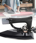 Close-up of Heavy Duty Industrial Steam Iron With Automatic Full Press Boiler featuring durable handle and steel base.