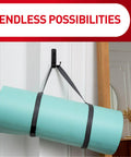 Front view of a Command indoor wall hook with gray straps holding a turquoise yoga mat