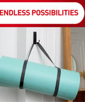 Indoor Small Replacement Strips For Command Hooks, 64 Pack, Damage Free Wall Hanging holding a rolled yoga mat on a wall.