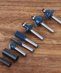 Top Tier Alloy Steel Router Bit Set With 8 Essential Pieces For Smooth Woodworking Milling And Precision Carving Tasks Using 1/4 Inch Shank Design For Pro Shop Results displayed on wood surface