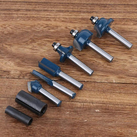 Top Tier Alloy Steel Router Bit Set With 8 Essential Pieces For Smooth Woodworking Milling And Precision Carving Tasks Using 1/4 Inch Shank Design For Pro Shop Results displayed on wood surface