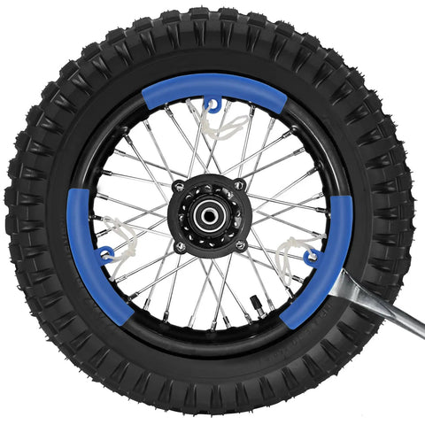 Honda Dirt Bike Tire And Inner Tube Set Front 2.50-14 Rear 3.00-12 durable tread on a blue-rimmed dirt bike wheel