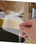 Hand installing Dustproof 6-Inch Bench Grinder Eye Shield Guard Kit, Reusable Eye Shields 2-Pack on grinding machine.