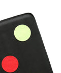 Close-up of Durable Microfiber Fencing Target With Bullseye For Saber Foil And Epee Self Training in black with red and green circles.