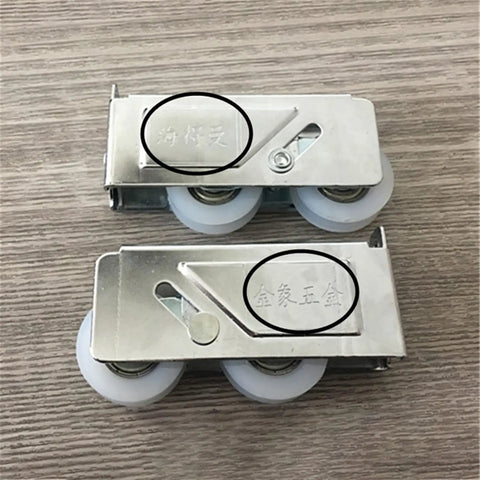 Heavy Duty Double Wheel Sliding Door Track Rollers With Rugged Aluminum Frame And Silent Nylon Wheels For Slick Action Windows And Smooth Room Panels Quick Swap Replacement Parts No Sweat Install, close-up of aluminum track rollers with engraved markings.