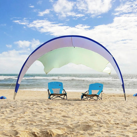 Windproof Beach Tent Sun Shelter With UPF50 Plus Protection, 11.5 By 10.5 Feet Beach Canopy over chairs on sandy beach