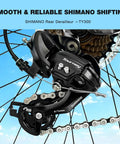 Close-up of Shimano rear derailleur on Women’s 26 Inch Mountain Bike For Adults with 21-speed shifting and steel frame.