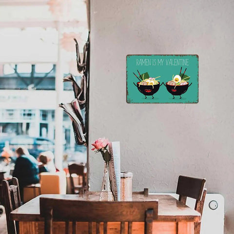 Ramen Is My Valentine Metal Sign 8x12 Inch Tin Wall Decor in bright cafe, displayed on wall above table with flowers.