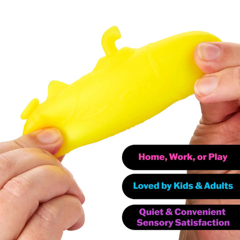 Fingers holding a yellow NeeDoh sensory squishy for stress relief in the Squishmas Advent Calendar with 24 Days Of Hype.