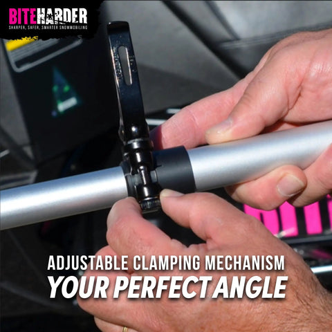 Close-up of hands adjusting a clamping mechanism on Snowmobile Side Support Pole For Safe Track Service And Suspension Maintenance Easy Setup And Removal Stable Lift Tool For Quick Maintenance Tasks Sharpening Runners Studs Lubricating Suspension Inspecting Track