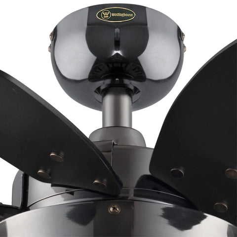 Close-up of Quince 24 Inch LED Ceiling Fan With Light in Gun Metal Finish, featuring black and graphite reversible blades.