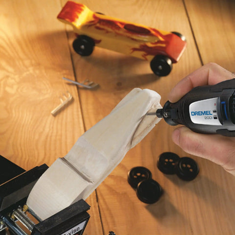 Person using Super Handy Two Speed Mini Rotary Tool Kit With 21 Accessories For All Your Diy Needs Like Woodworking Carving.