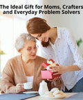 Two women at a table, one gifting a pink box to the other, with text saying 'The Ideal Gift for Moms, Crafters and Everyday Problem Solvers.'