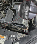 Close-up of 4 Piece Heavy Duty Engine Air Filter Box Cover Screw Bolts For Air Intake Housings on Honda rig.