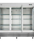 Heavy Duty Three Door Glass Front Commercial Refrigerator Reach In Cooler Built Tough With Stainless Steel Exterior 66.5 Cubic Feet open view with shelves.