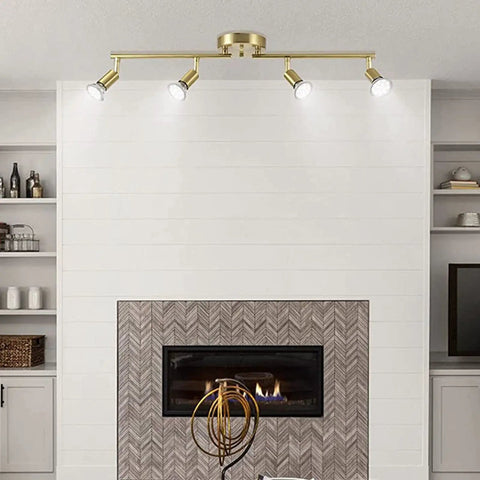 Gold Finish LED 4 Light Track Lighting Kit With Rotatable Heads And Foldable Track Fixtures above modern fireplace