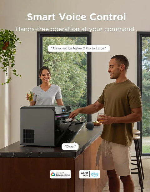 Real Talk Smart Countertop Ice Maker Cranks Out Fresh Ice In Three Minutes Great For Game Day Parties And Home Bars A Serious Kitchen Badass Everyone Needs, seen with two people using voice control in a modern kitchen.