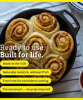 Seasoned Cast Iron Baker’s Skillet with dual handles baking cinnamon rolls, showing even heating and durability.