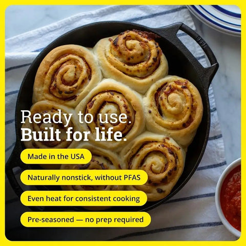 Seasoned Cast Iron Baker’s Skillet with dual handles baking cinnamon rolls, showing even heating and durability.