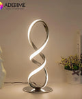 LED Spiral Bedside Lamp With Stepless Dimming 12W 3000K Warm White Modern Nightstand Desk Light, sleek silver finish.