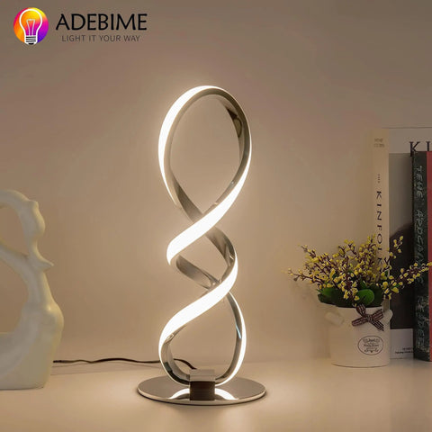 LED Spiral Bedside Lamp With Stepless Dimming 12W 3000K Warm White Modern Nightstand Desk Light, sleek silver finish.