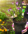 Digital Soil pH Meter for Gardeners, Fast Direct pH Tester for Plants, shown in a pot of purple flowers, accurate readings