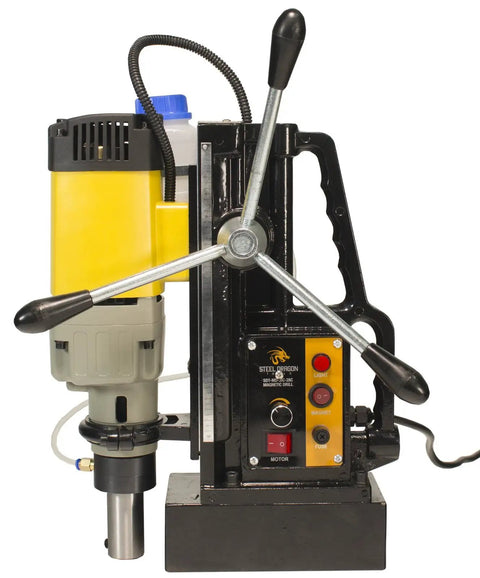 Heavy Duty Magnetic Drill Press Come Loaded With 7pc Annular Cutter Kit Crafted To Chomp Through Solid Metal Like Butter Quick Rack Lever Depth Fine Tuning 1850W Power side view showing controls and cutting drill.