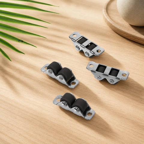 Mini Fixed Drawer Rubber Caster Wheels Featuring A Slick Low Profile Build That Rolls Smooth As Butter And Stays Dead Steady For Zero Drama Furniture Glide Every Time - close-up of four rubber caster wheels with steel mounts.