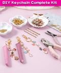 All In One Lip Gloss Keychain Making Kit With 100 Enamel Charms, clips, chains, pliers, hole punch and tubes on table