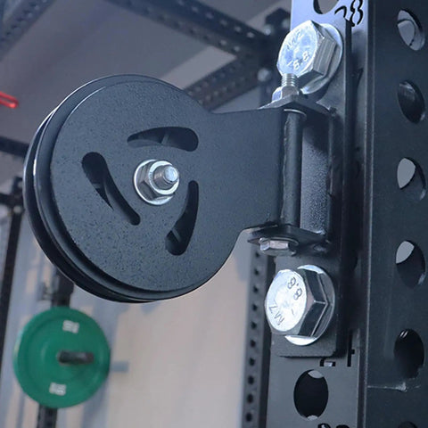 Heavy Duty Gym Cable Pulley With Detachable Rotation And Quiet Swivel Durable Fitness Pulley Attachment close-up on steel frame