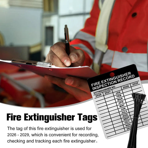 Metal Fire Extinguisher Inspection Tags 2026 2029 Aluminum Weatherproof 2.3 By 3 Inch with black wire ties beside clipboard